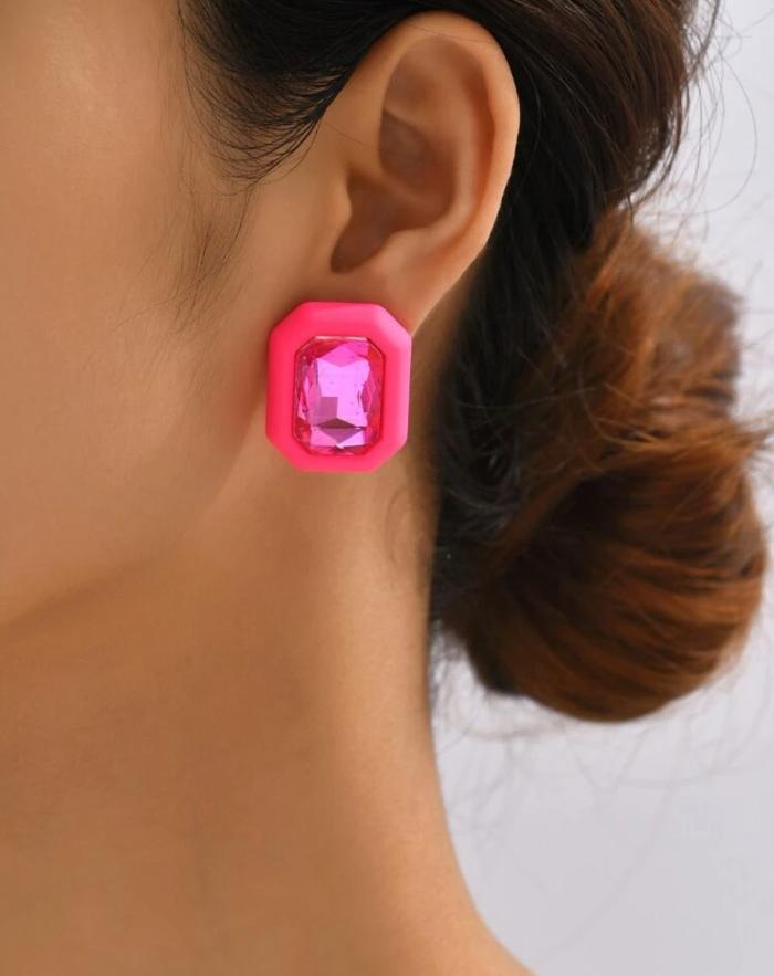 Icon oorbel roze met 8 hoeken en roze ingelegde grote strass steen